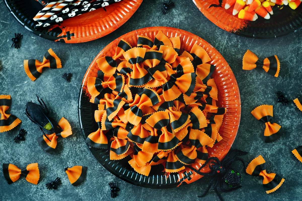 Raw Pasta farfalle and candy corn for Halloween