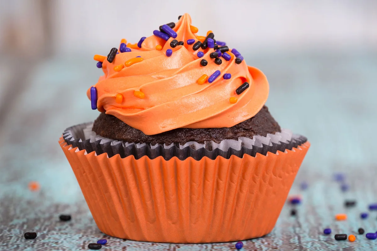 Orange and Black cupcakes with sprinkles for Halloween