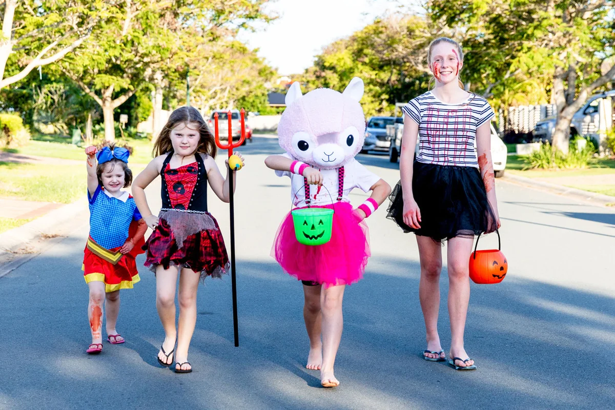 Australian children trick or treating on Halloween