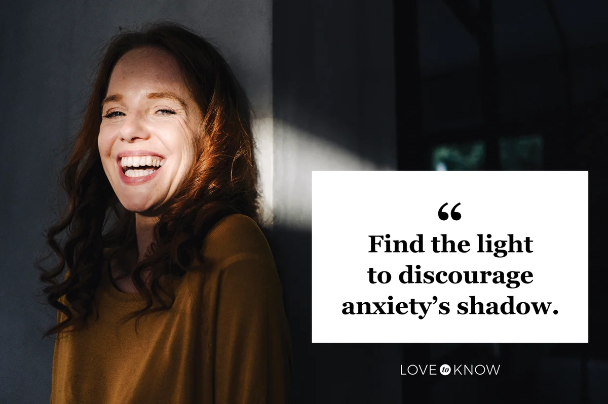 Laughing redheaded woman with light and shadow