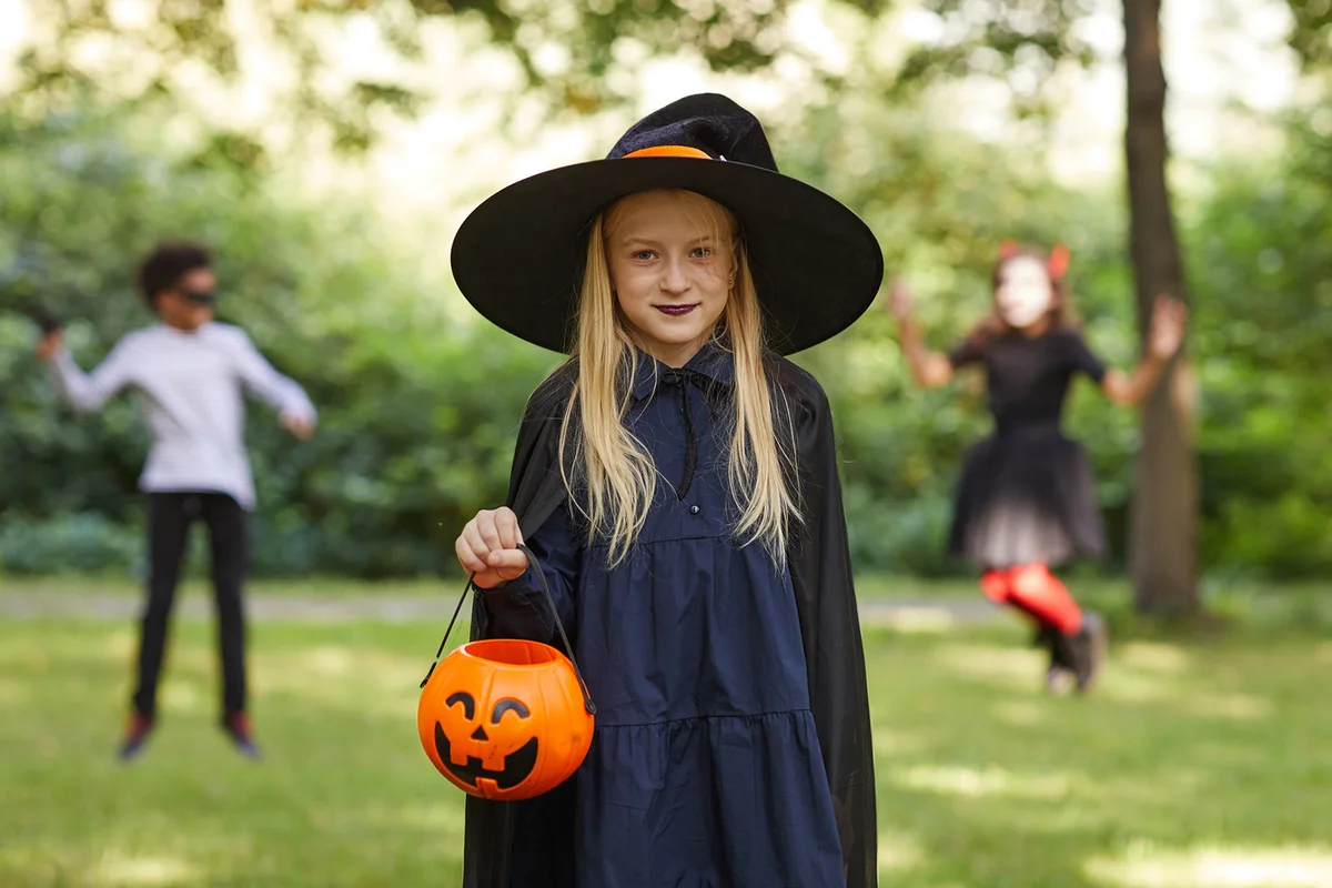 Teenage Girl Wearing Witch Costume for Halloween