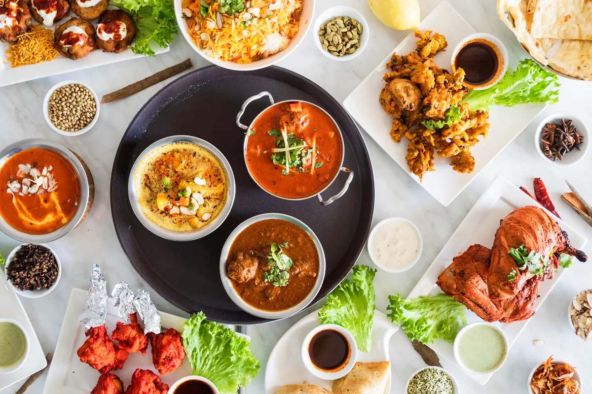 Table top view of various different varieties of Indian Cuisines