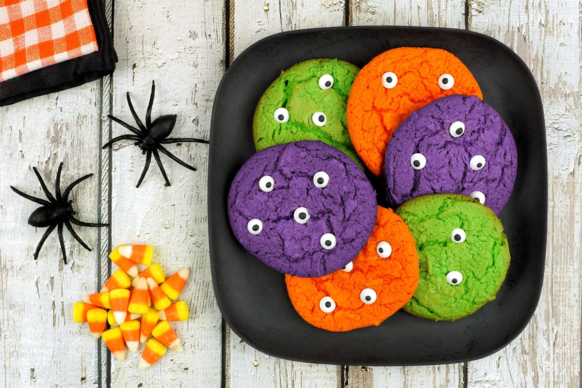 Halloween green purple and orange decorated cookies