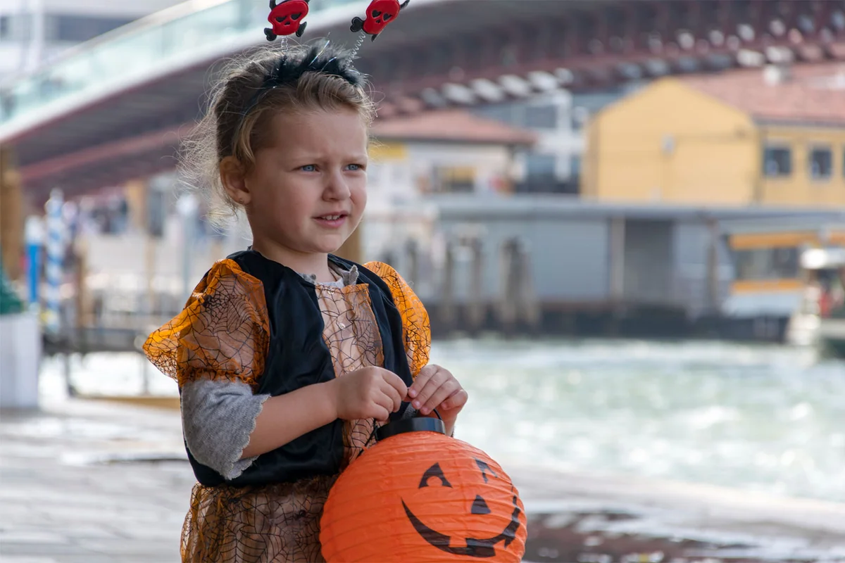 girl in costume in Italy at Halloween