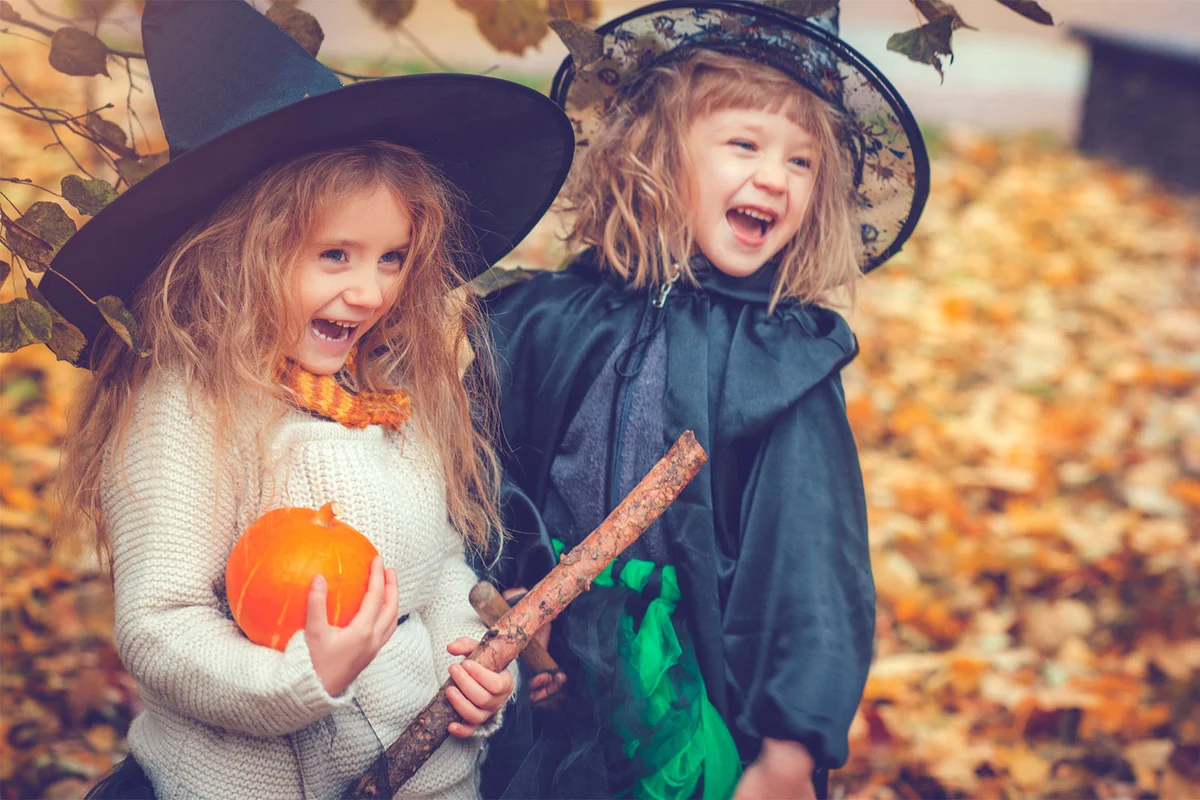 children in witch costumes