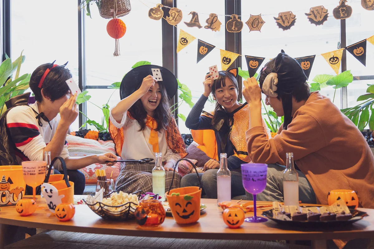 People playing a Halloween party game