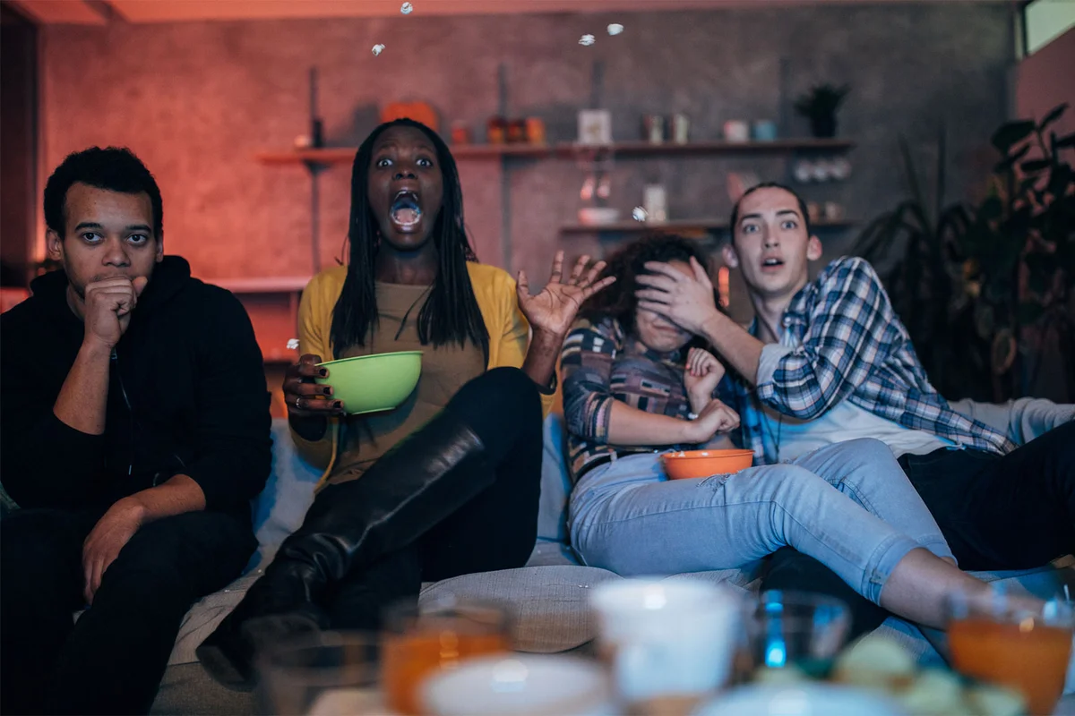 teenagers watching scary movie