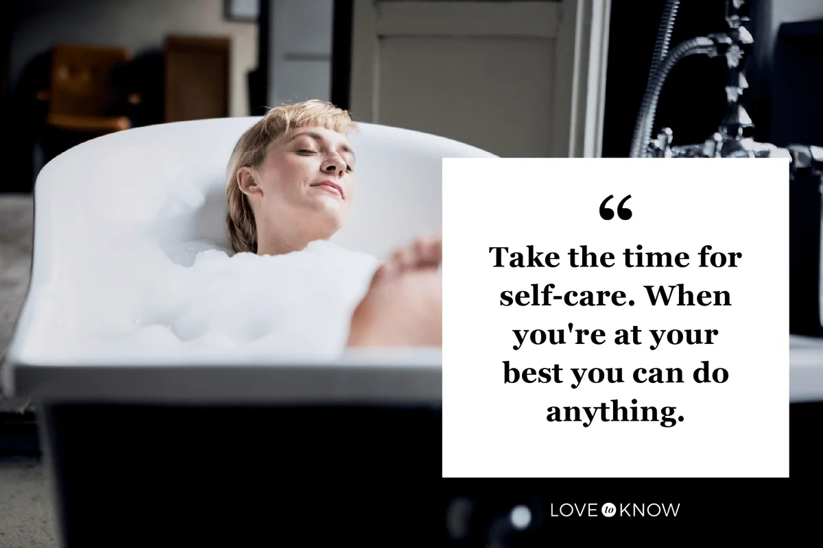 Blond woman taking bubble bath in a loft