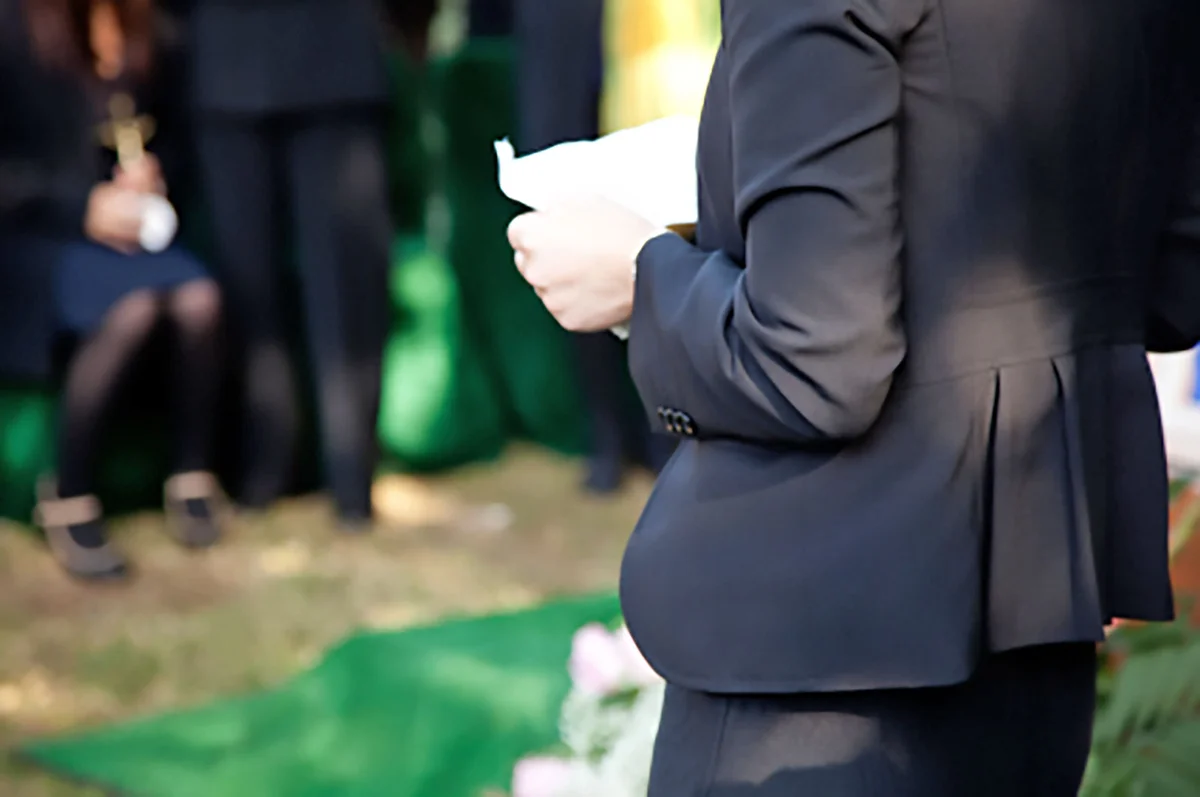 reading a poem at graveside