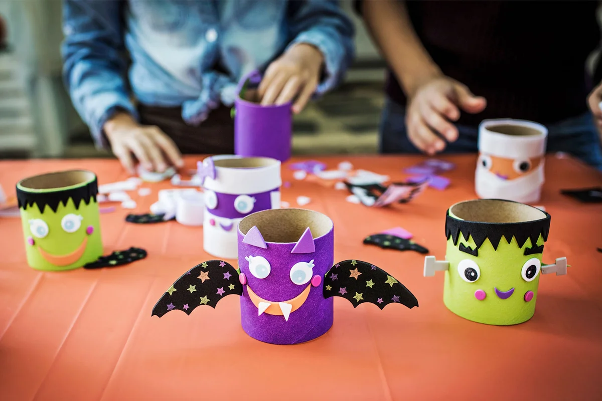 children making Halloween crafts