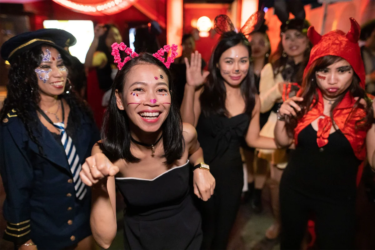 People celebrating Halloween street party in Japan