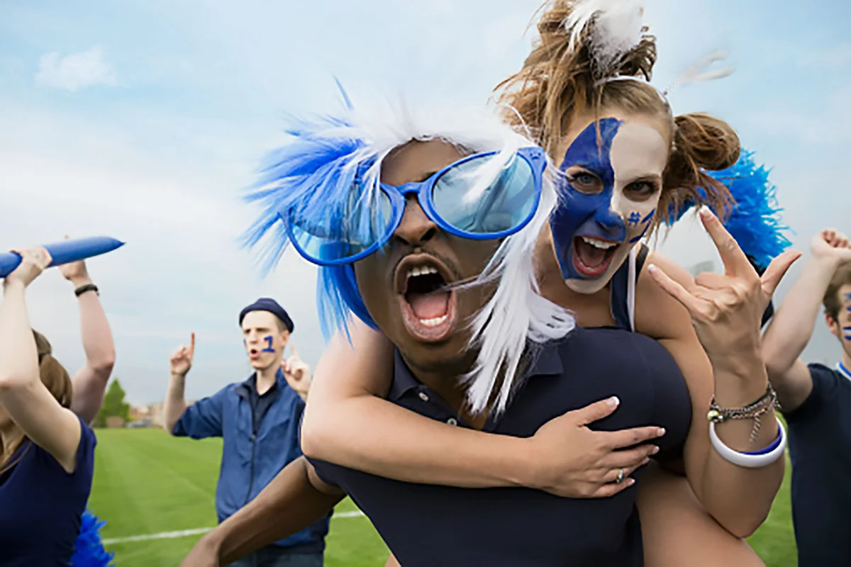 couple enthusiastic fans