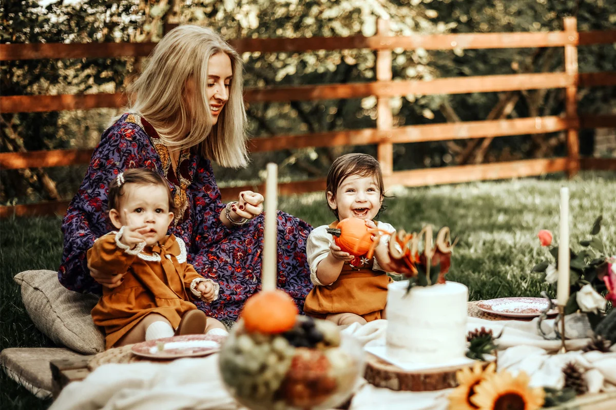 toddler and baby at Halloween Birthday party