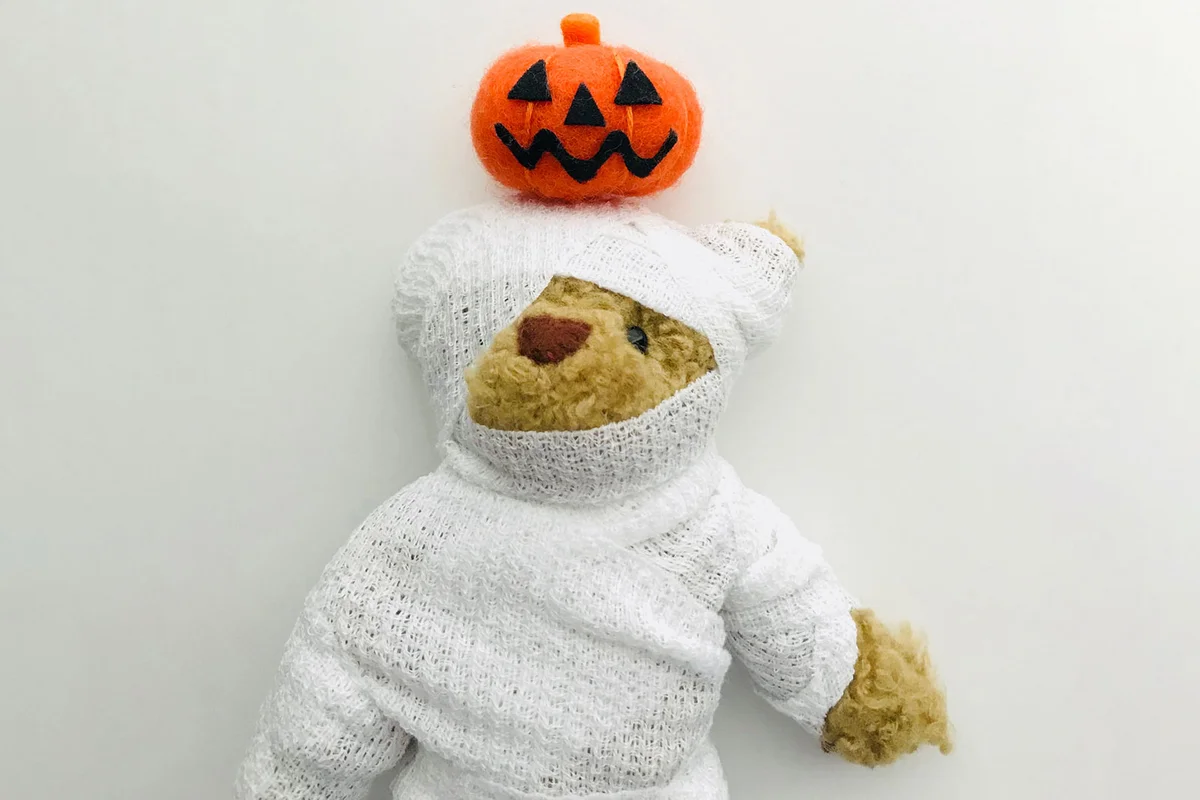 stuffed animal teddy bear dressed as mummy for Halloween