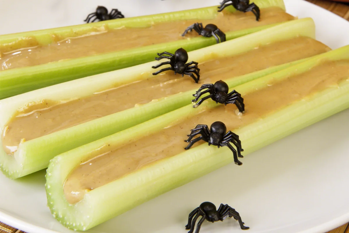 peanut butter celery decorated with spiders toddler Halloween party snack