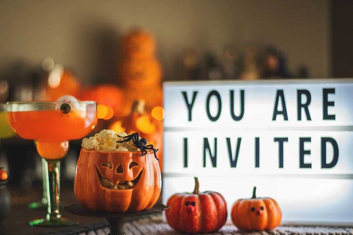 Halloween party still life with pumpkin characters invitation message