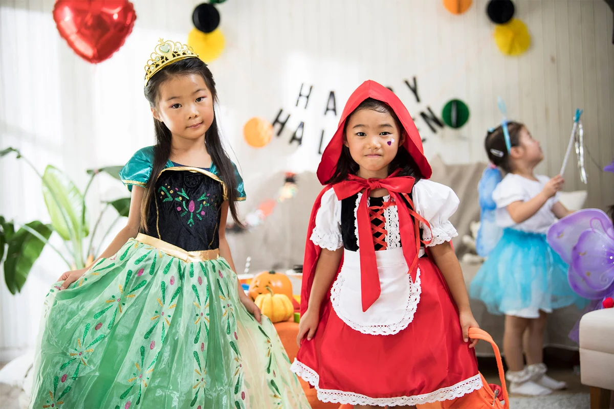 children in commercial Halloween costumes