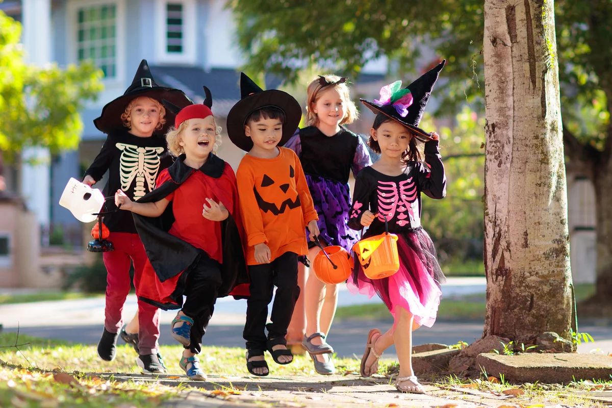 Children trick-or-treating as a Halloween tradition in United States