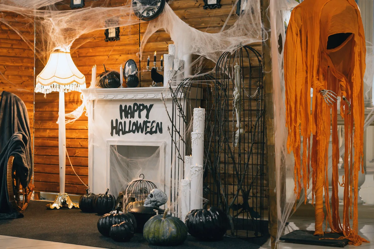 spooky decorated fireplace for a halloween party
