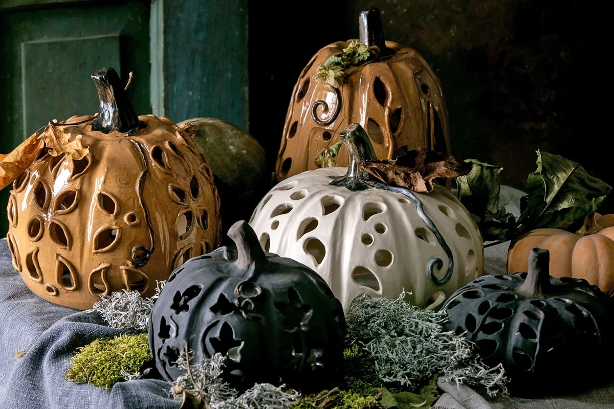 spray painted Halloween ceramic pumpkins table decoration