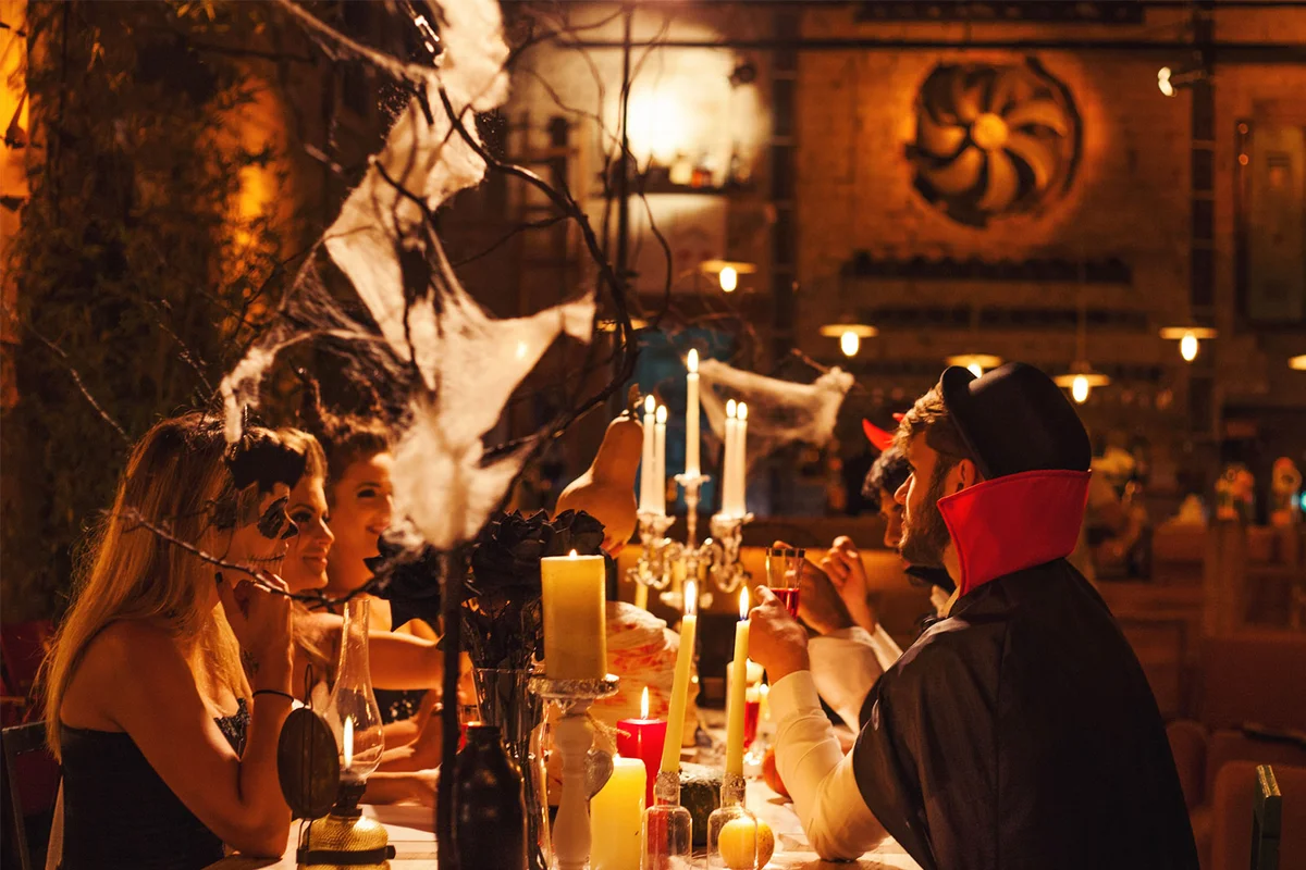 Halloween spider web decoration above table