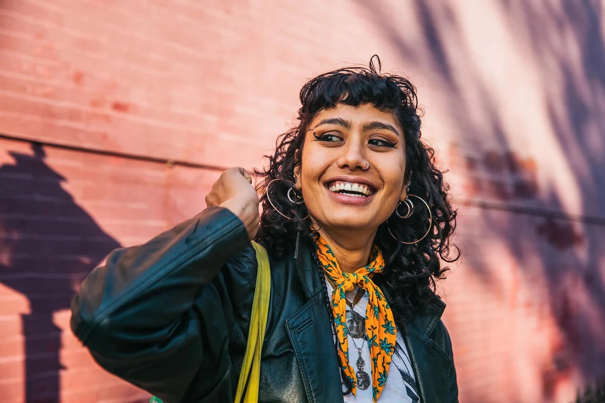 Young confident woman smiling