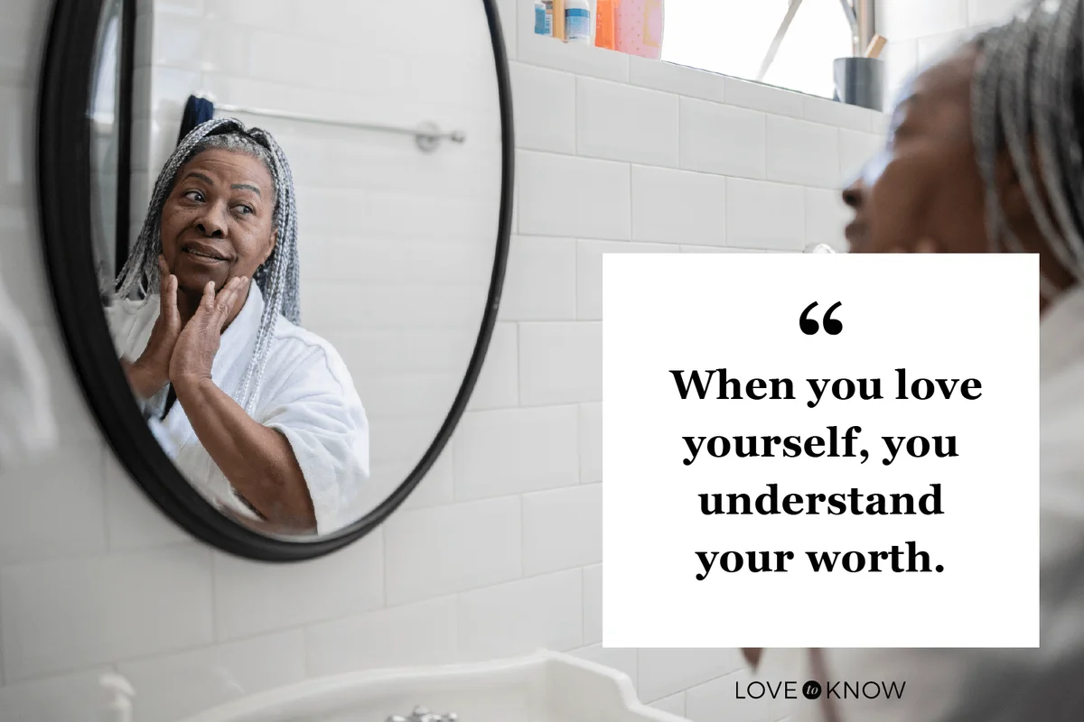 Senior woman applying facial moisture on face at home