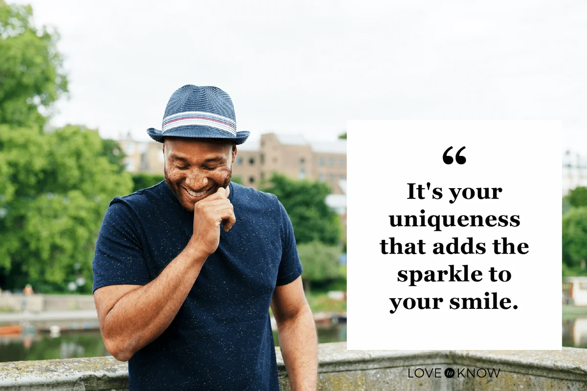 Man looking down, smiling