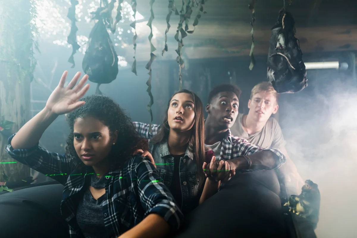 Group of friends in garage haunted house