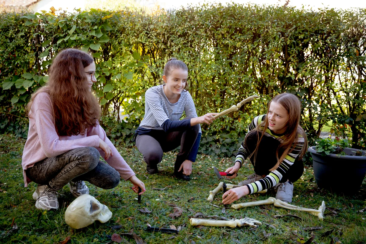 Friends having a Skeleton Scavenger Hunt