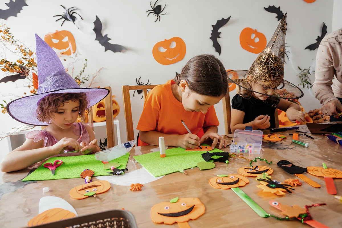 Kids making Halloween signs