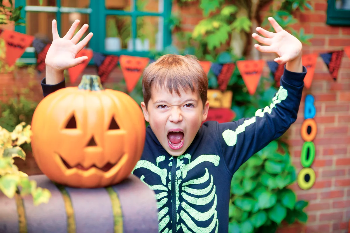 Trick or treat mischievous boy