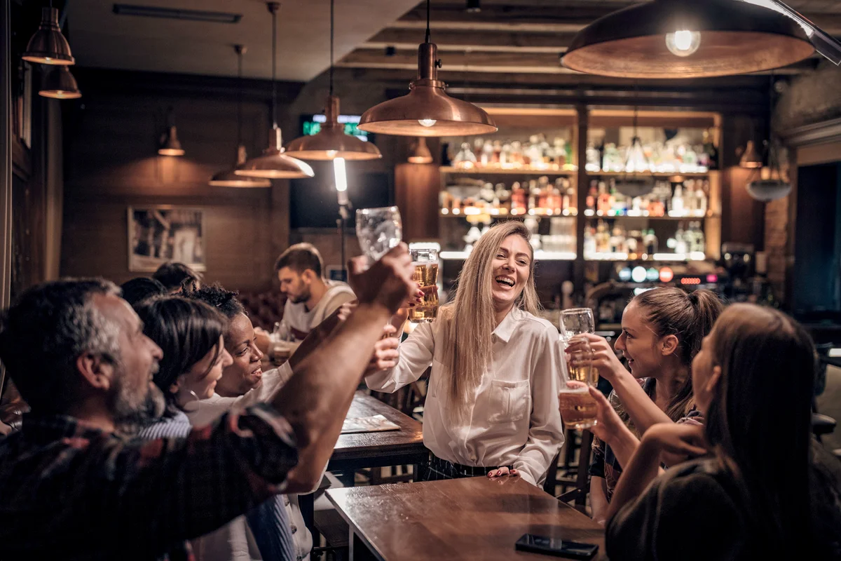 People drinking beer in the pub