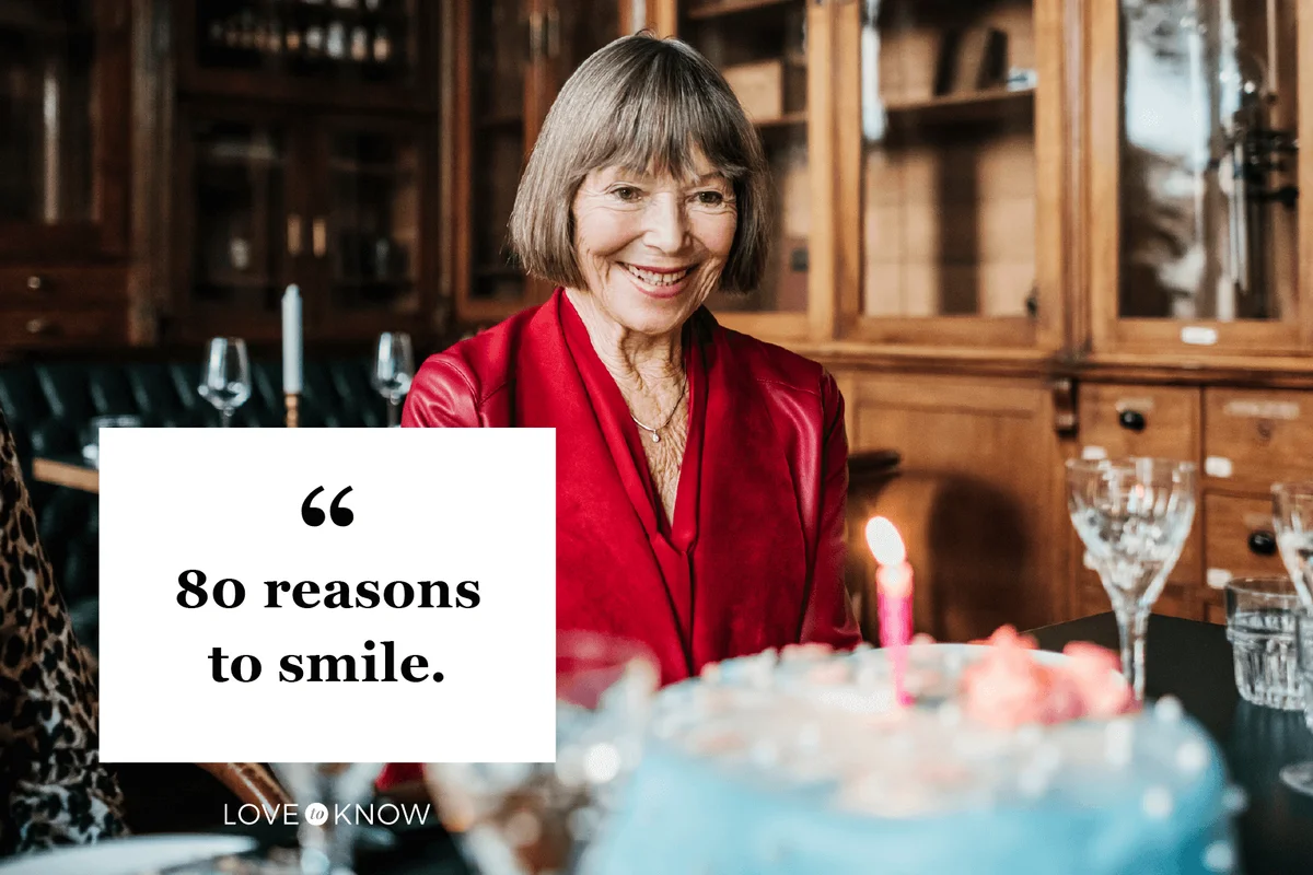 Woman Smiling While Looking At Birthday Cake