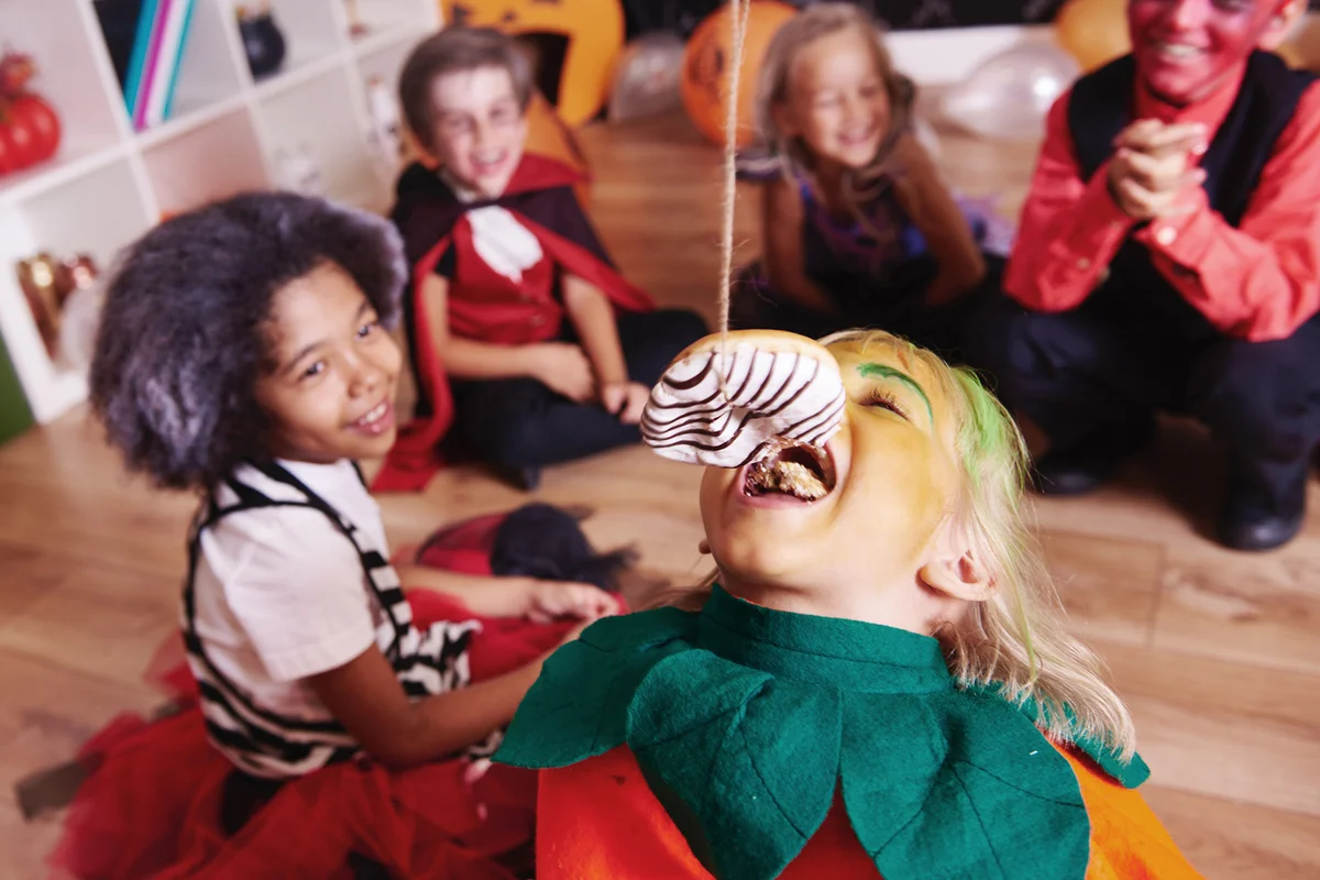 Children enjoying at halloween party