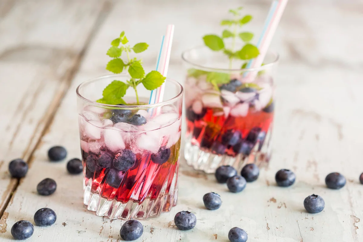 Fresh mineral water with blueberries, mint, sirup and ice