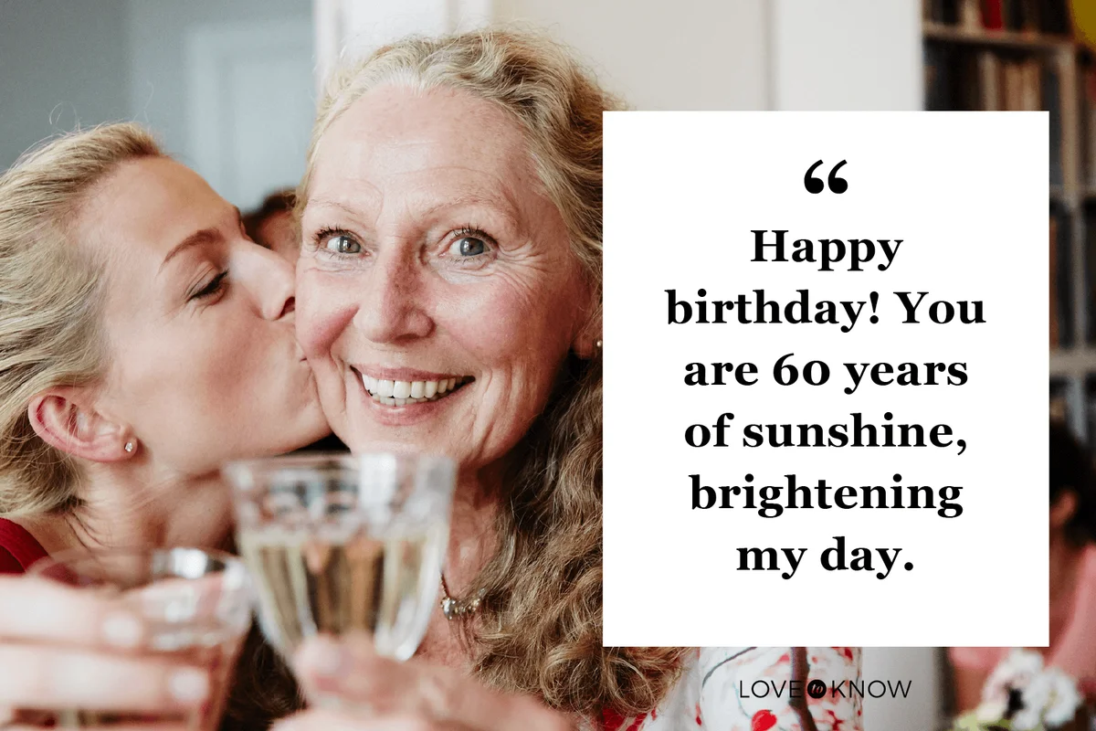 Happy friends raise a glas of sparkling wine at a party