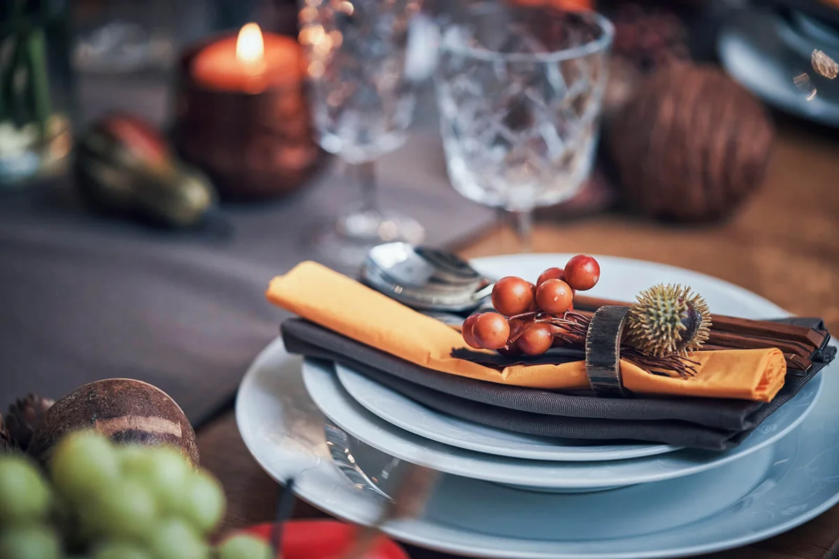 Decorated Table for Thanksgiving Dinner with Candles