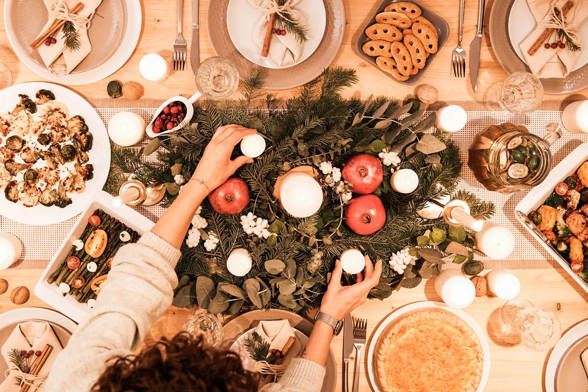 High angle view of woman decorating holiday table
