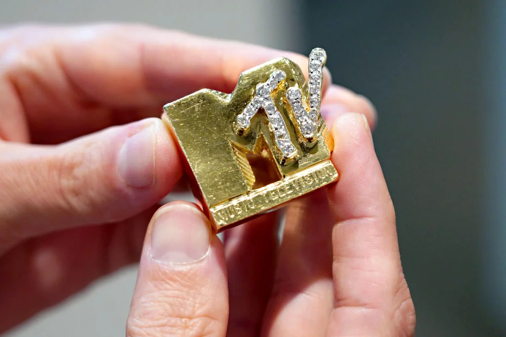 Freddy's gold and diamond 'MTV' ring