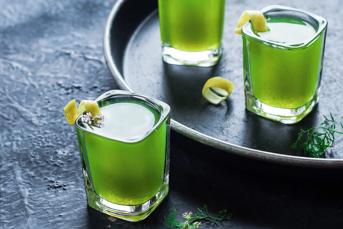 Cucumber shot glasses on table