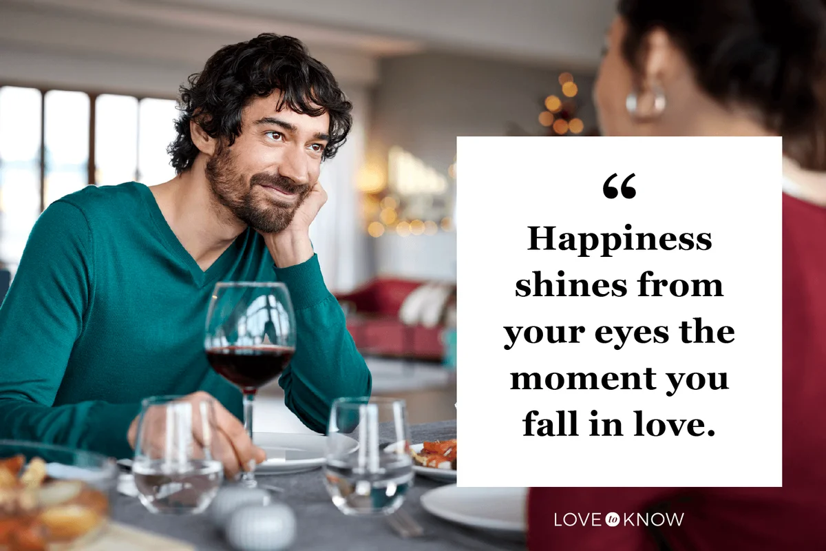Smiling Man With Woman At Dining Table