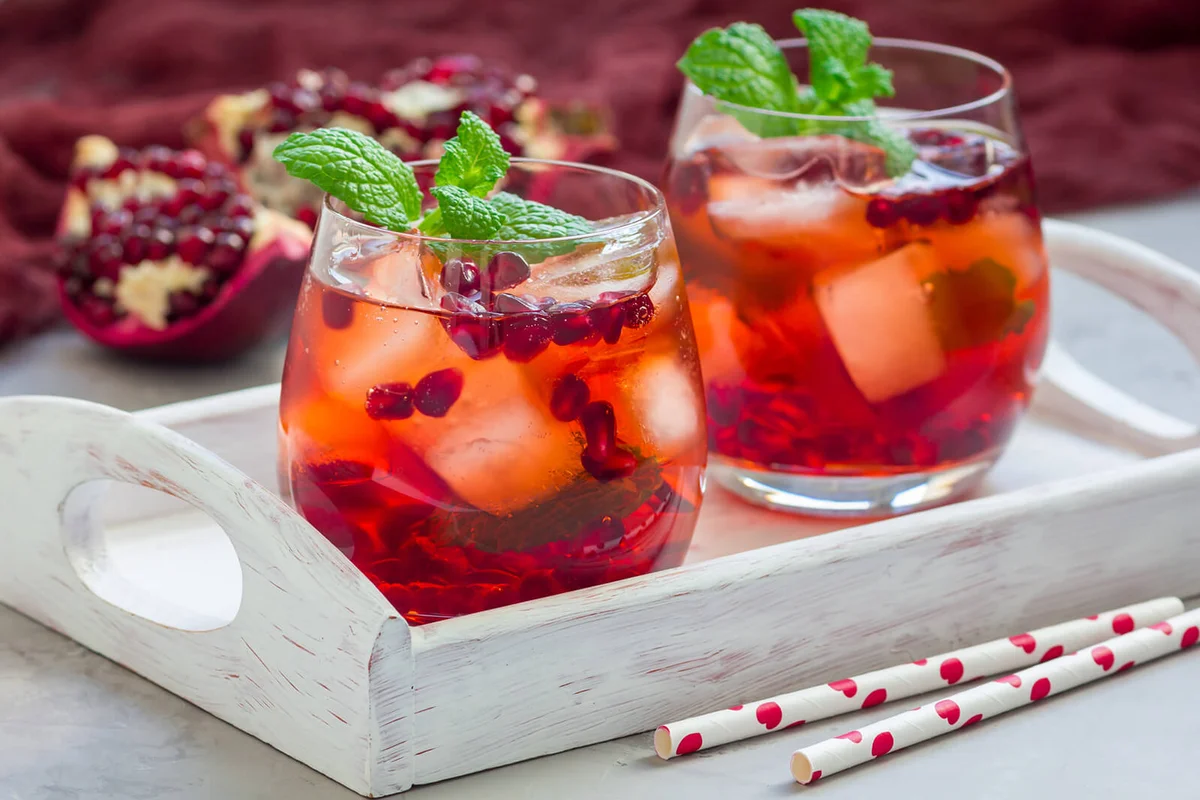 Mojito cocktail with pomegranate