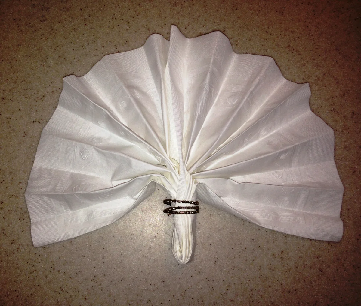 Fan napkin ring fold