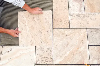 variegated tile floor being laid