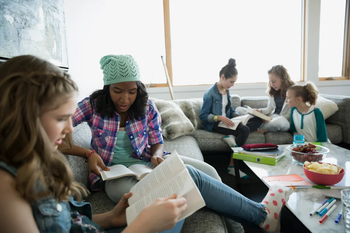 Tween girls doing classwork