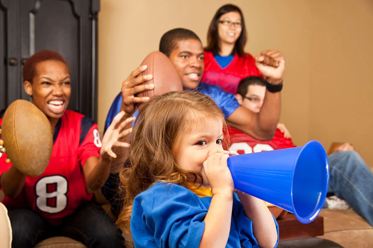 Fans watching football