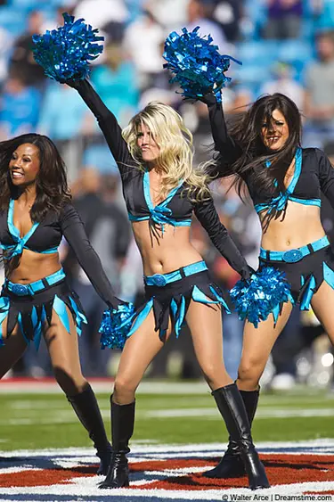 The TopCats Cheerleading Squad perform as the Carolina Panthers play host to the Baltimore Ravens at Bank of America Stadium in Charlotte, NC.