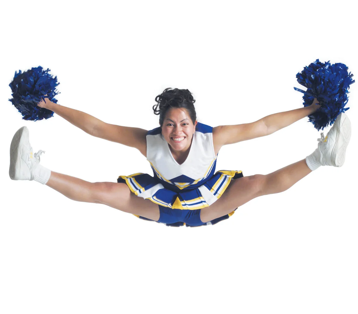 cheerleader jumps high in the air and does the splits