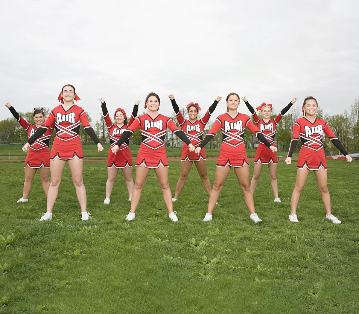 Cheerleaders performing routine